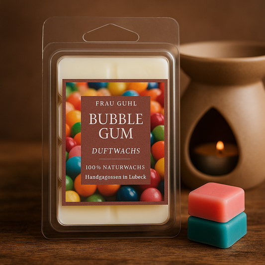 Duftwachs Bubble Gum von Frau Guhl mit 6 pinken Wachsstücken in Blisterform, auf hellem Hintergrund dekoriert mit Kaugummikugeln – 75 g Packung mit Originaletikett.